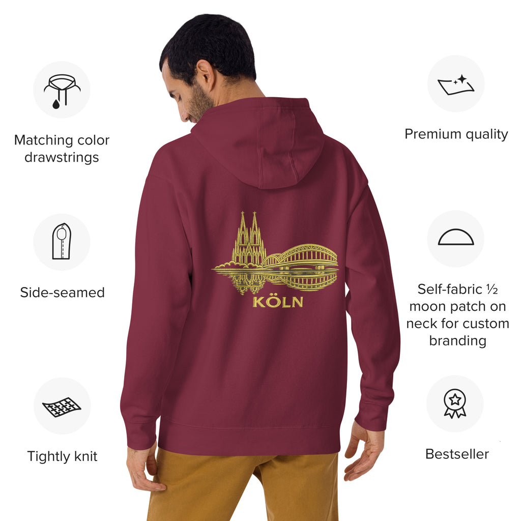 Maroon hoodie with gold 'Köln' design on the back, displayed on a man, with product features listed.