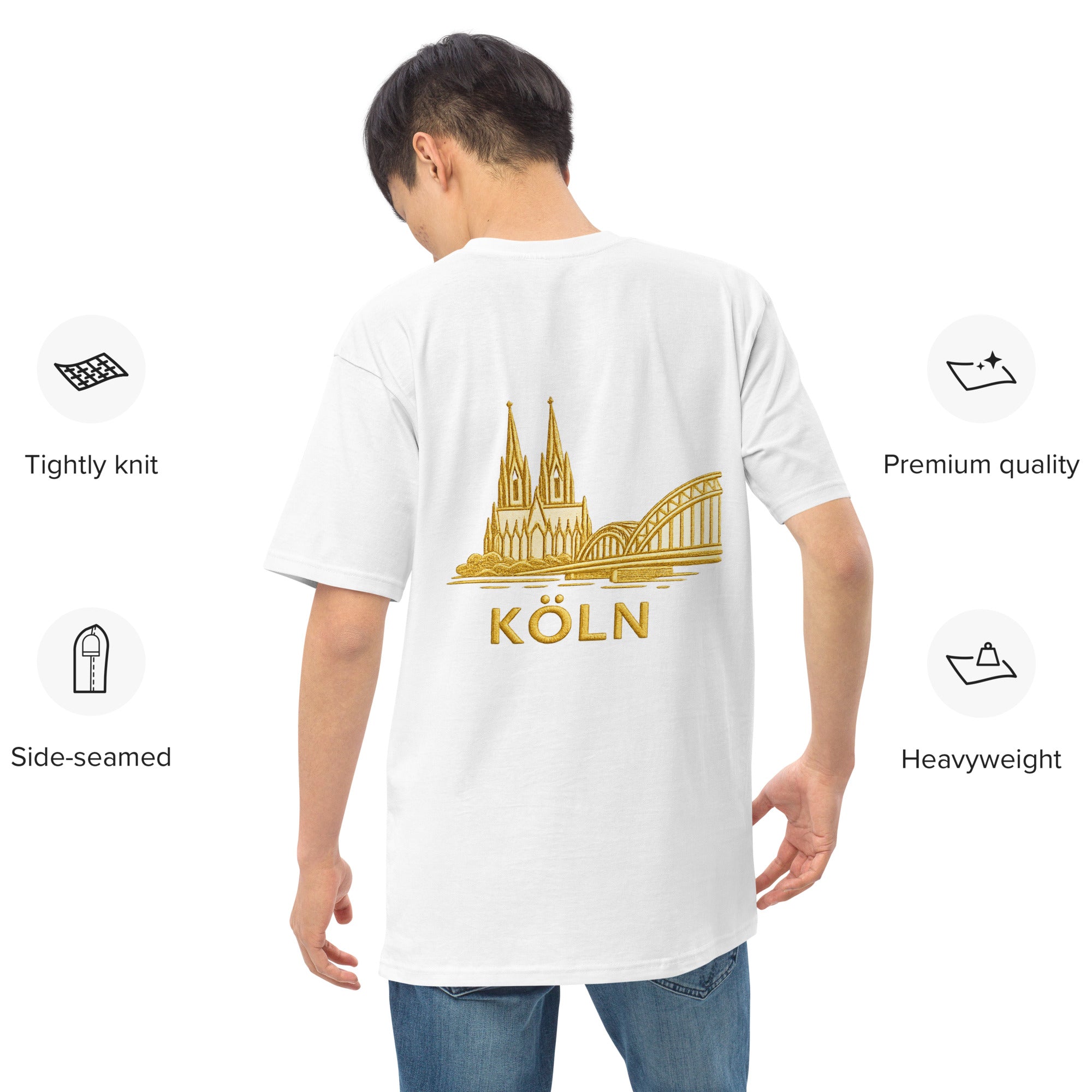 Person wearing a white t-shirt with gold 'Köln' and cathedral design on a white background