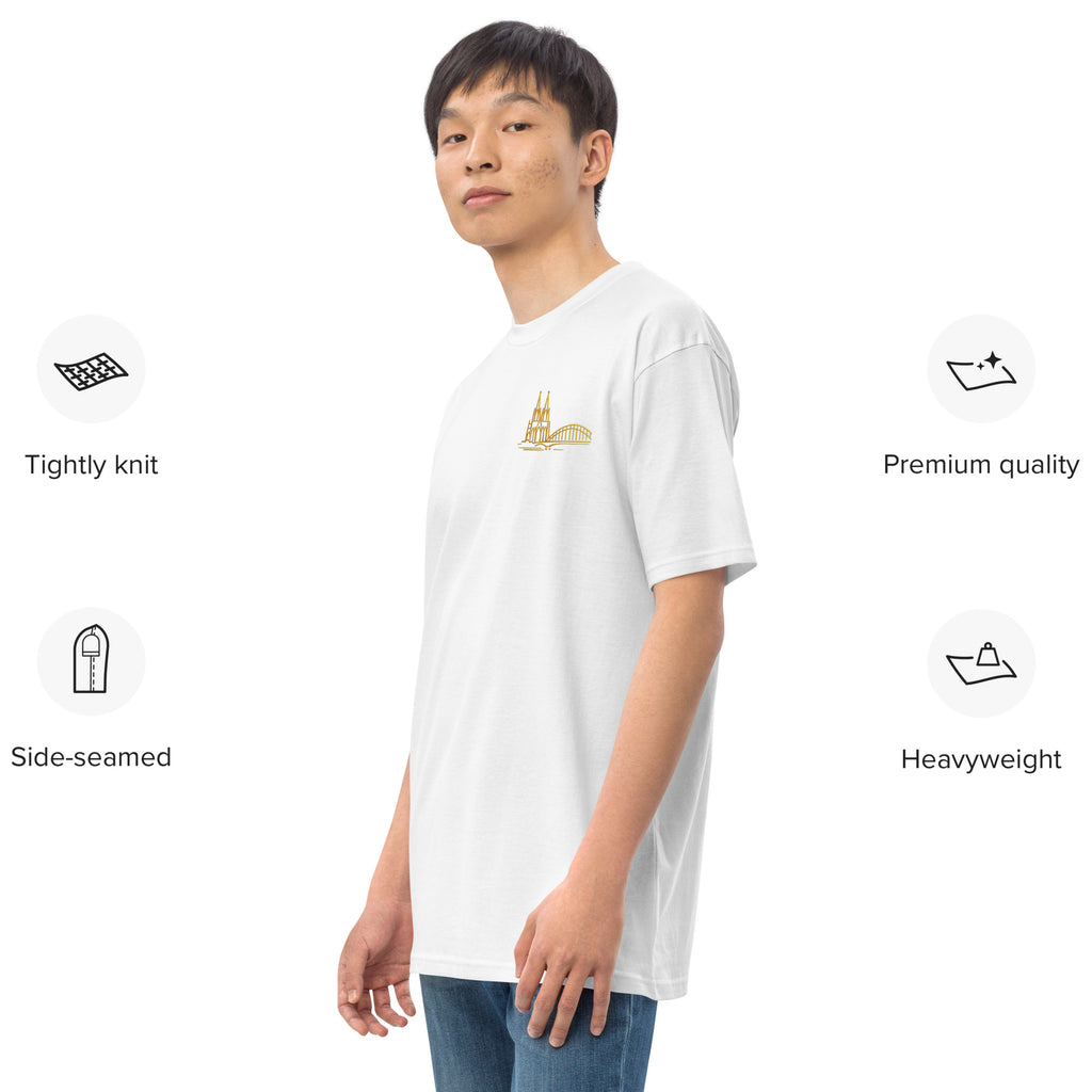 Person wearing a white t-shirt with a small logo, standing against a white background with text about t-shirt features.