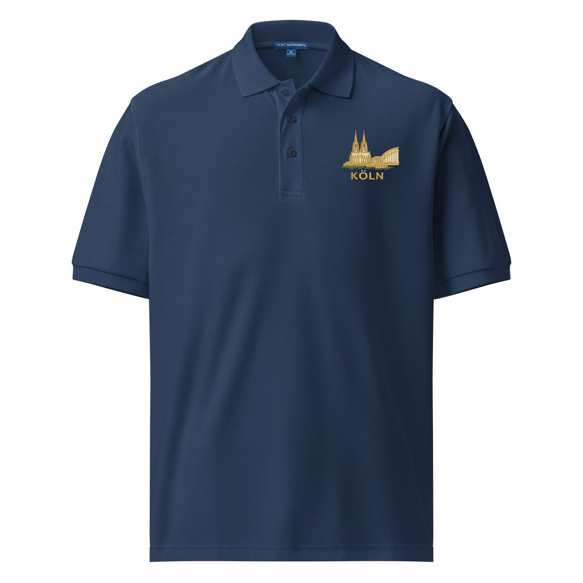 Navy blue polo shirt with gold emblem and 'Köln' text on a white background