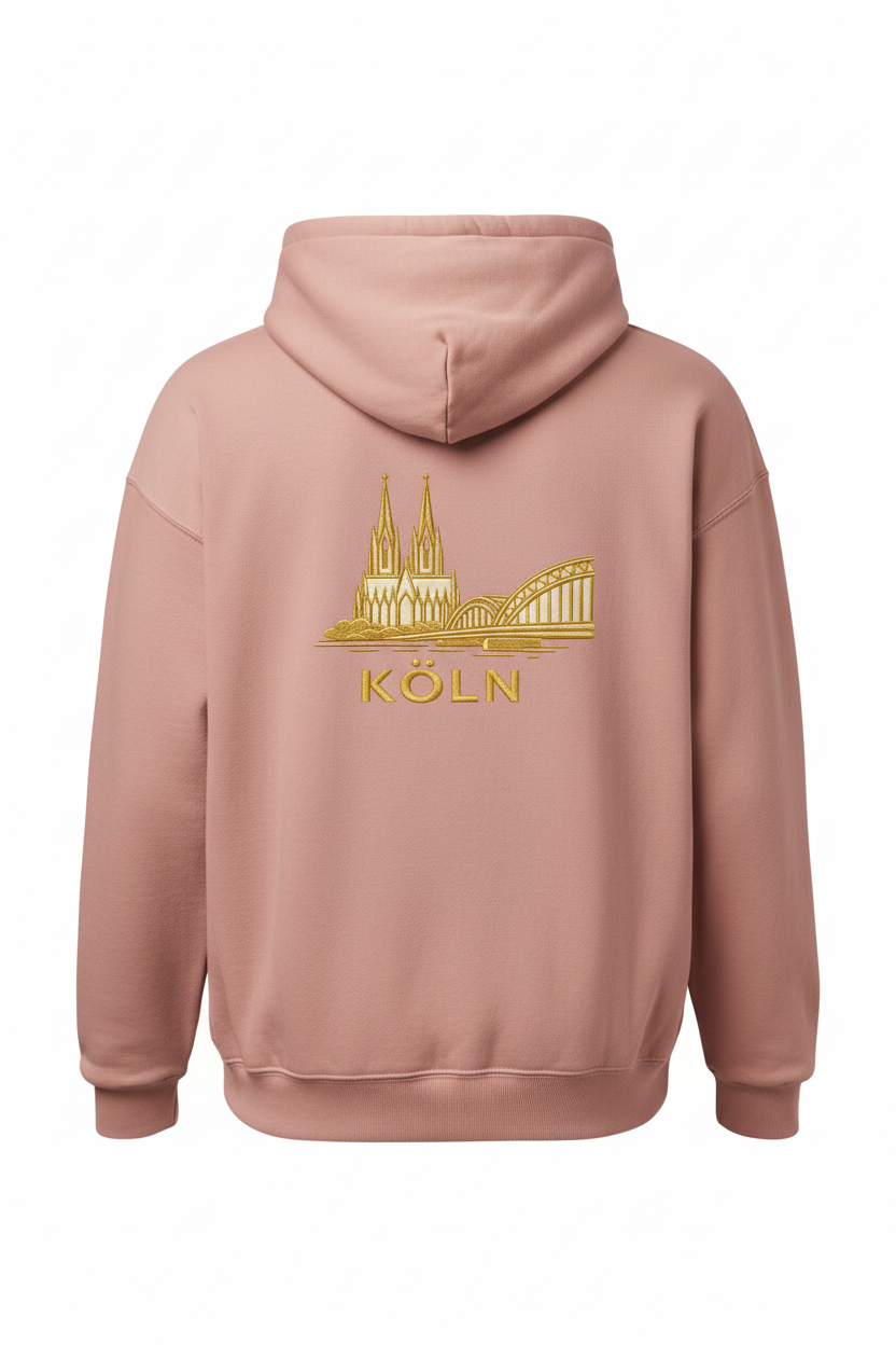 Rose gold hoodie with gold 'Köln' and cathedral design on a white background