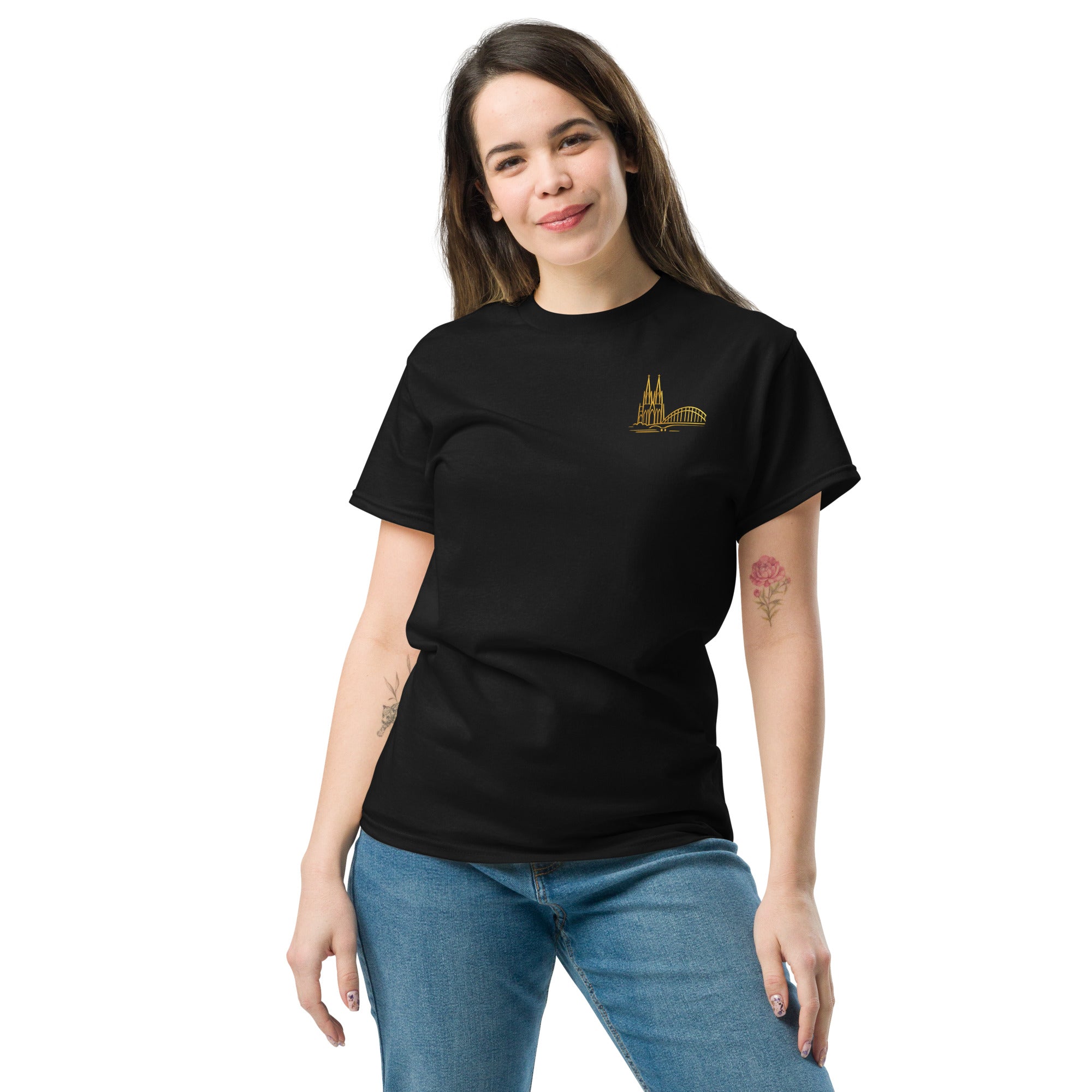 Woman wearing a black t-shirt with a gold logo on a white background