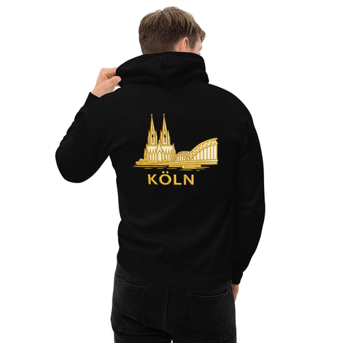 Person wearing a black hoodie with gold 'Köln' design on the back