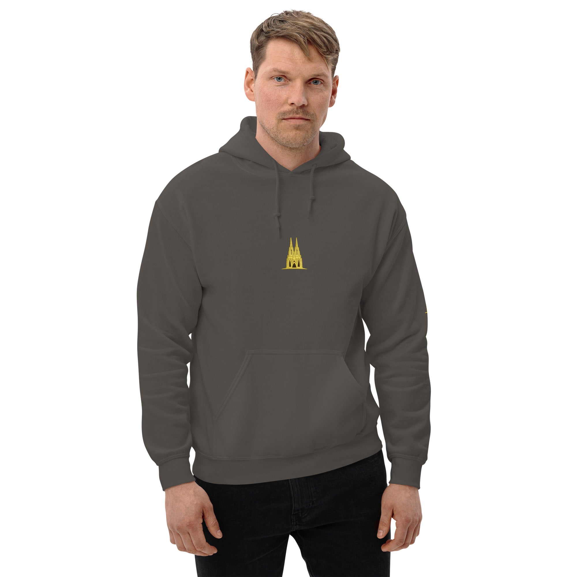 Man wearing a gray hoodie with a ygolden köln logo on a white background
