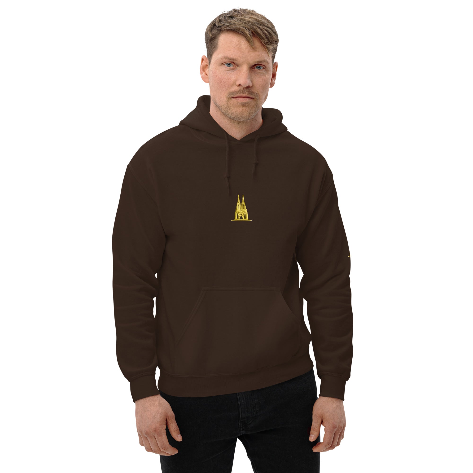 Man wearing a brown hoodie with a gold köln logo on a white background