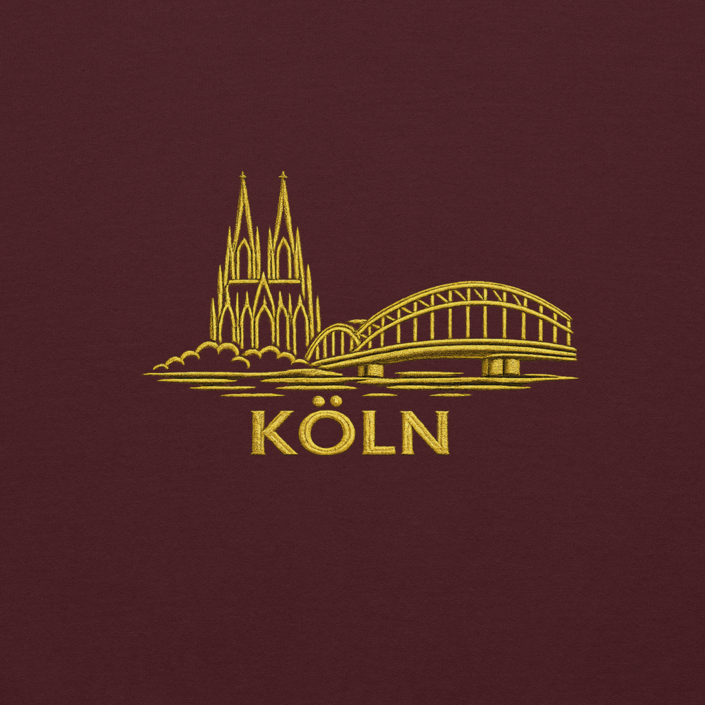 Gold outline of a cathedral and bridge with 'Köln' text on a dark red background