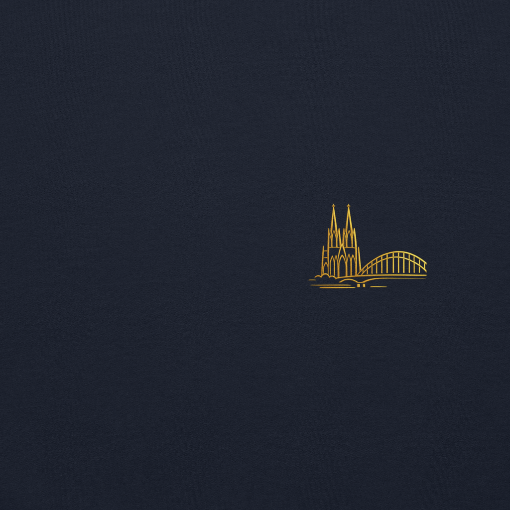 Gold line art of a cathedral and bridge on a dark blue background